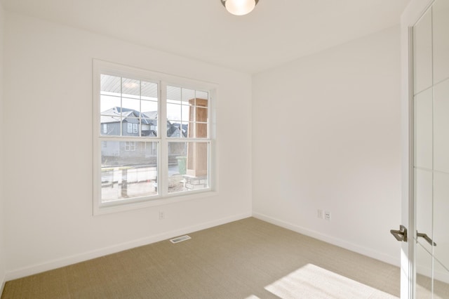 15710 112th Ave N, Dayton, MN 55369 - carpeted spare room featuring healthy amount of natural light and baseboards