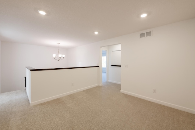 15710 112th Ave N, Dayton, MN 55369 - empty room with light carpet, a chandelier, recessed lighting, and baseboards