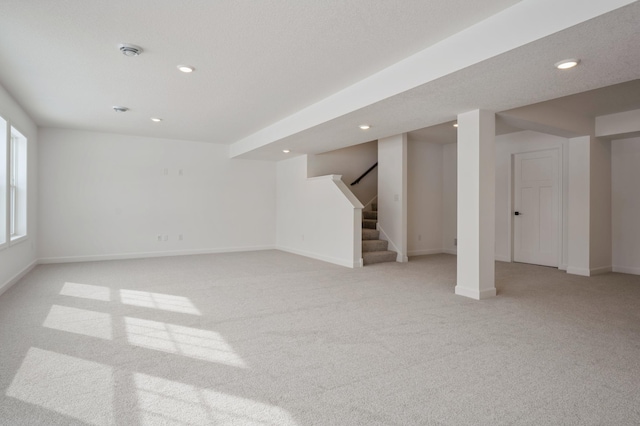 15710 112th Ave N, Dayton, MN 55369 - below grade area with light colored carpet, recessed lighting, stairway, and baseboards