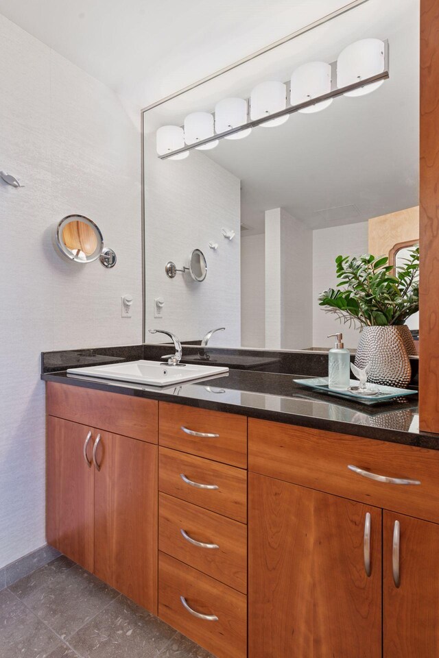 215 10th Ave S Unit 812, Minneapolis, MN 55415 - bathroom featuring vanity and baseboards