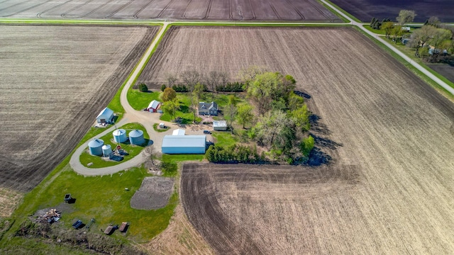 aerial view of sparsely populated area featuring farmland