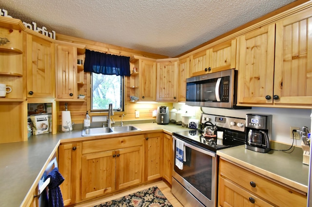 5151 99th Ave, Clear Lake, MN 55319 - kitchen featuring open shelves, appliances with stainless steel finishes, a sink, a textured ceiling, and light brown cabinets