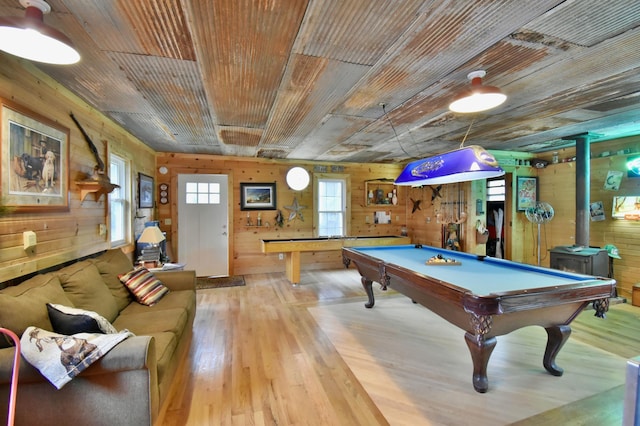 5151 99th Ave, Clear Lake, MN 55319 - game room featuring light wood-style floors, wood walls, billiards, a wood stove, and wooden ceiling