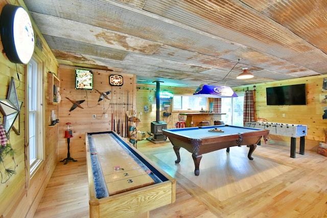 5151 99th Ave, Clear Lake, MN 55319 - game room featuring wood walls, a wood stove, billiards, and wood finished floors
