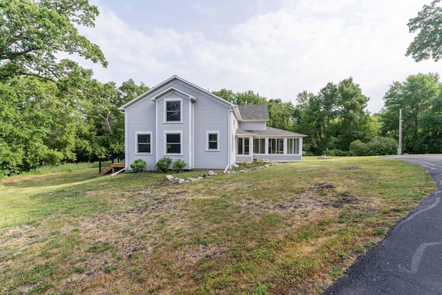 15126 Tumuli Rd, Dalton, MN 56324 - traditional-style home featuring a front lawn