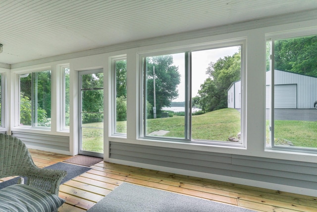 15126 Tumuli Rd, Dalton, MN 56324 - sunroom with wood-type flooring