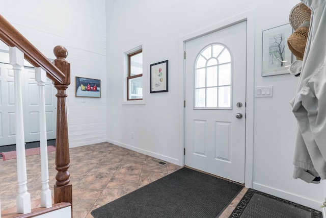 15126 Tumuli Rd, Dalton, MN 56324 - entryway with baseboards and stairway
