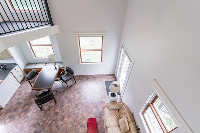15126 Tumuli Rd, Dalton, MN 56324 - office with a towering ceiling, healthy amount of natural light, and baseboards