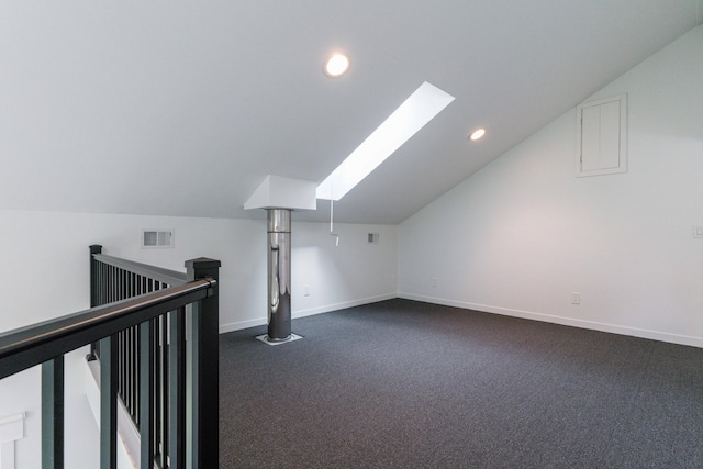 15126 Tumuli Rd, Dalton, MN 56324 - additional living space featuring lofted ceiling, a skylight, dark carpet, recessed lighting, and baseboards