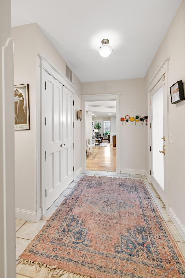 421 Summit Ave Unit 2, Saint Paul, MN 55102 - hall featuring light tile patterned floors and baseboards