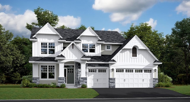 view of front of house featuring board and batten siding, a front lawn, driveway, and stone siding