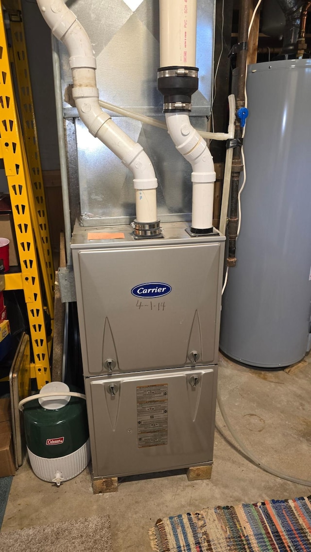 109 Gray Pl W, Marshall, MN 56258 - utility room with water heater and heating unit