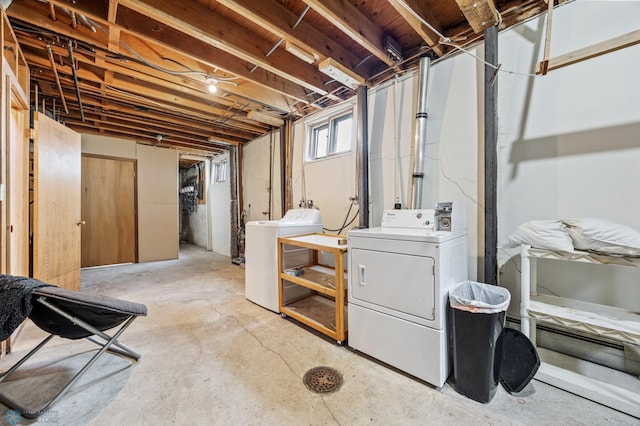 below grade area featuring separate washer and dryer