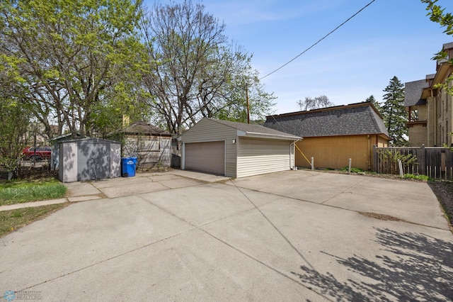 detached garage with fence