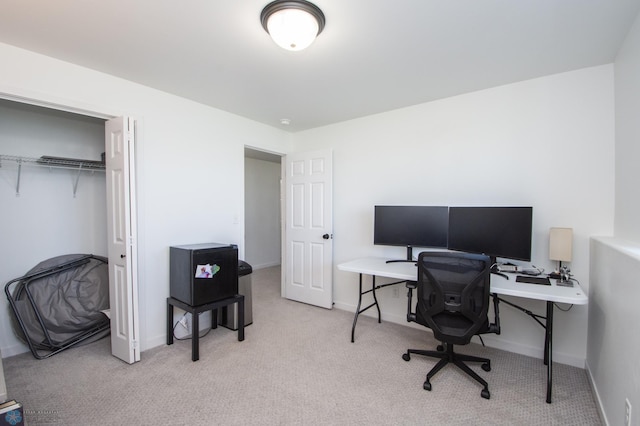 carpeted office with baseboards