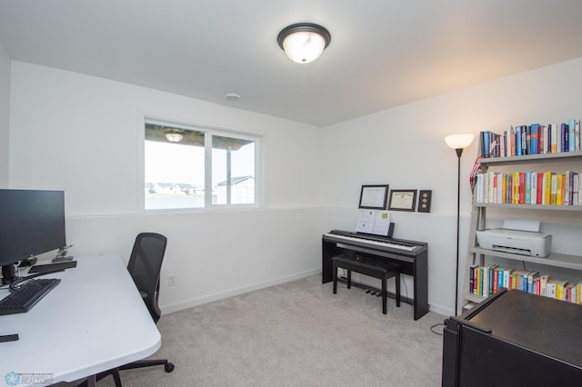 office space featuring carpet and baseboards