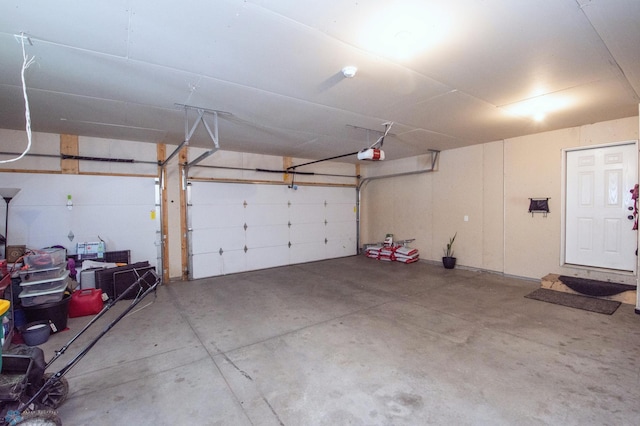 garage featuring a garage door opener