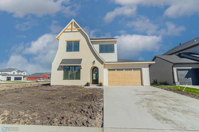 8820 Northern Lights Ave, Fargo, ND 58047 - view of front of property featuring driveway and a garage