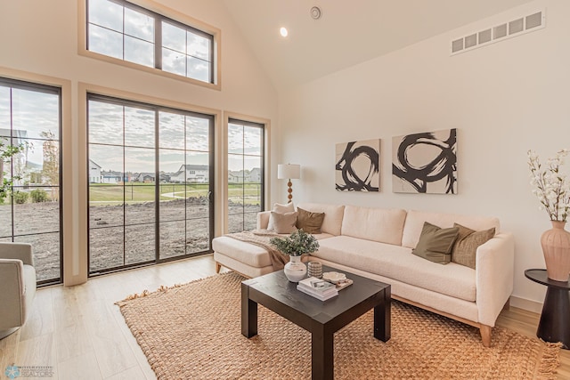 8820 Northern Lights Ave, Fargo, ND 58047 - living room featuring high vaulted ceiling and recessed lighting