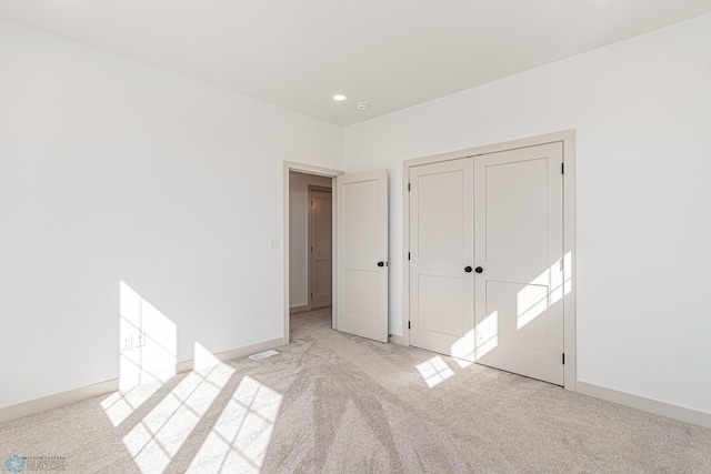 8820 Northern Lights Ave, Fargo, ND 58047 - unfurnished bedroom featuring carpet flooring, baseboards, and a closet