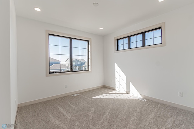 8820 Northern Lights Ave, Fargo, ND 58047 - carpeted spare room featuring baseboards and recessed lighting