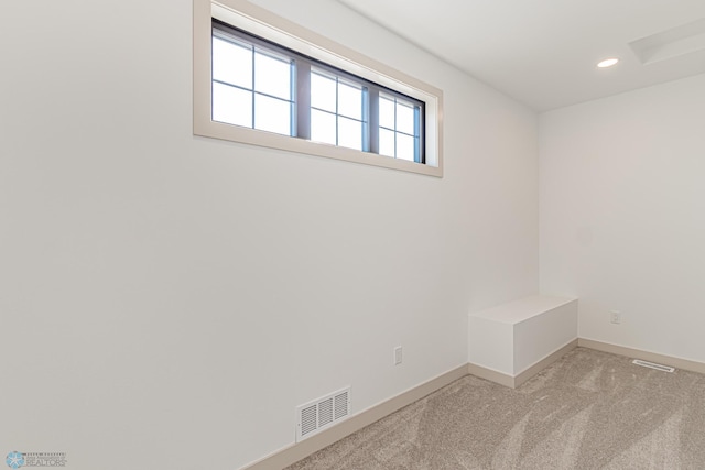 8820 Northern Lights Ave, Fargo, ND 58047 - unfurnished room with baseboards, light carpet, and recessed lighting