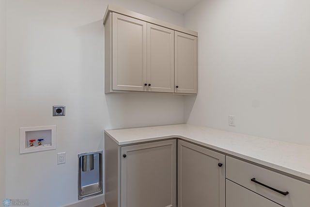 8820 Northern Lights Ave, Fargo, ND 58047 - laundry room with cabinet space, hookup for an electric dryer, and washer hookup