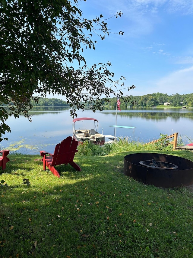 2132 295th Ave, Luck, WI 54853 - view of grassy yard with an outdoor fire pit and a water view