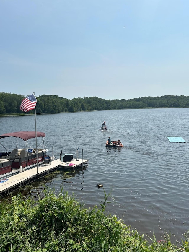 2132 295th Ave, Luck, WI 54853 - dock area featuring a water view and a forest view