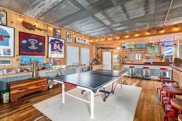 2132 295th Ave, Luck, WI 54853 - rec room featuring hardwood / wood-style flooring and wooden walls