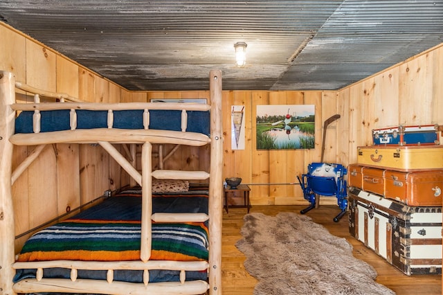 2132 295th Ave, Luck, WI 54853 - bedroom with wood finished floors and wooden walls