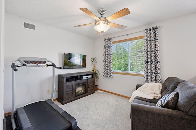 2011 Silver St, Waconia, MN 55387 - living room with carpet flooring, baseboards, and ceiling fan