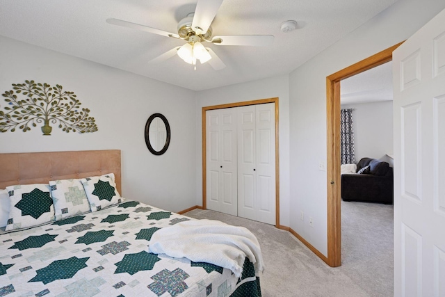 2011 Silver St, Waconia, MN 55387 - carpeted bedroom featuring a closet, baseboards, and ceiling fan