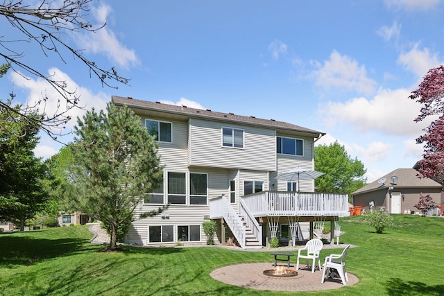 2011 Silver St, Waconia, MN 55387 - back of property featuring a fire pit, stairway, a deck, and a yard