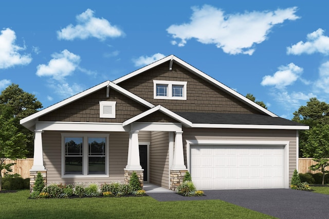 craftsman house featuring driveway