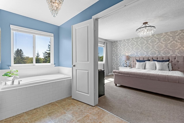bedroom featuring a chandelier, wallpapered walls, and light tile patterned floors