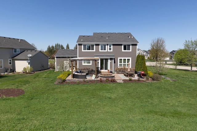 back of property with a pergola, a patio, a yard, and central AC unit