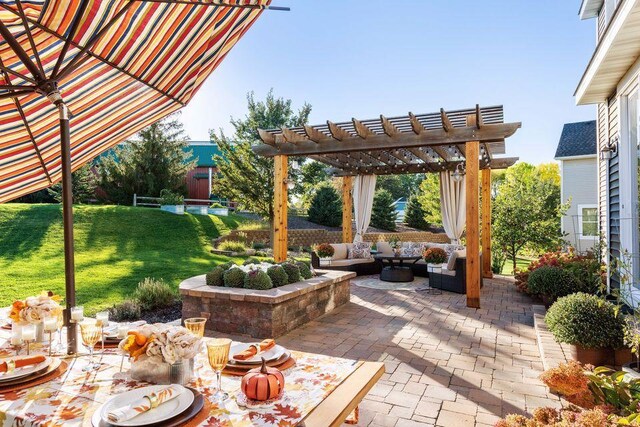 view of patio with an outdoor hangout area and a pergola