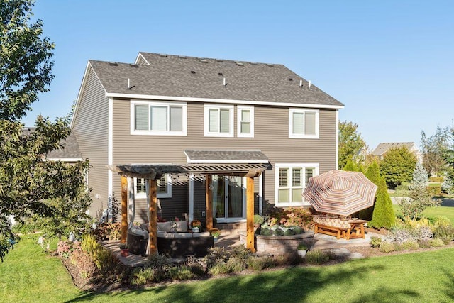 rear view of house featuring a pergola, a patio, a shingled roof, an outdoor hangout area, and a lawn
