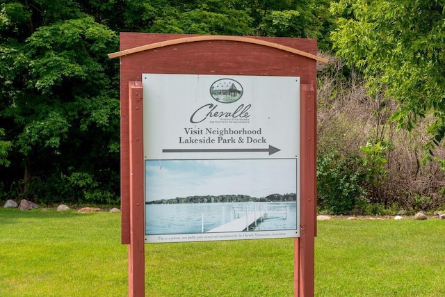 community sign with a yard