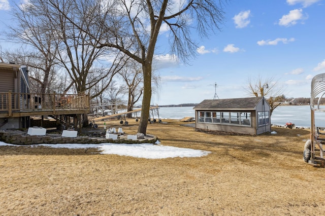 1683 Hansack Ave NE, Saint Michael, MN 55376 - view of yard with a deck with water view and an outdoor structure