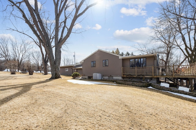 1683 Hansack Ave NE, Saint Michael, MN 55376 - rear view of house featuring cooling unit and a deck