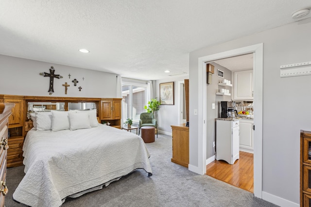 1683 Hansack Ave NE, Saint Michael, MN 55376 - bedroom with light carpet, recessed lighting, baseboards, and a textured ceiling