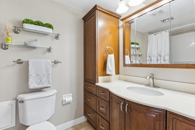 1683 Hansack Ave NE, Saint Michael, MN 55376 - bathroom featuring toilet, vanity, tile patterned flooring, curtained shower, and baseboards