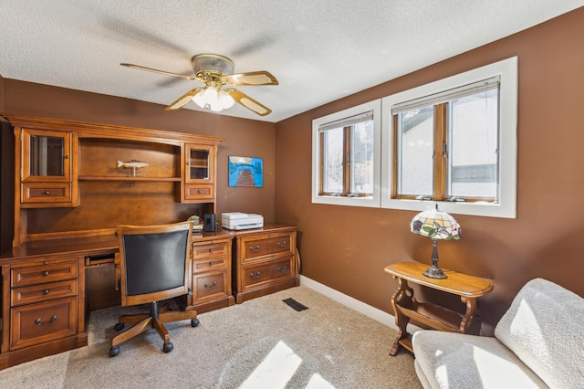 1683 Hansack Ave NE, Saint Michael, MN 55376 - carpeted office featuring ceiling fan, baseboards, a textured ceiling, and built in study area