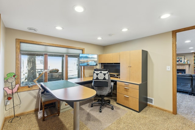 1683 Hansack Ave NE, Saint Michael, MN 55376 - office with baseboards, light carpet, recessed lighting, and a lit fireplace