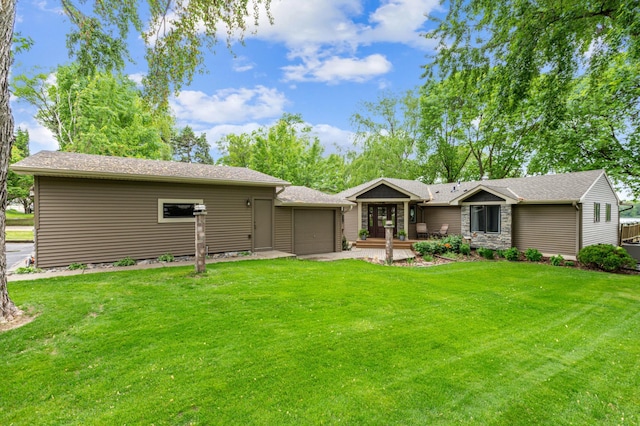 1683 Hansack Ave NE, Saint Michael, MN 55376 - back of property featuring an attached garage and a yard