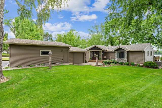 1683 Hansack Ave NE, Saint Michael, MN 55376 - rear view of house with a lawn, an attached garage, and cooling unit