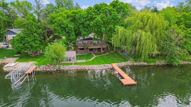 1683 Hansack Ave NE, Saint Michael, MN 55376 - dock area with a lawn and a deck with water view