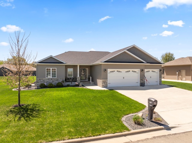 2006 13th Ave NE, Austin, MN 55912 - craftsman inspired home featuring stone siding, concrete driveway, an attached garage, and a front lawn